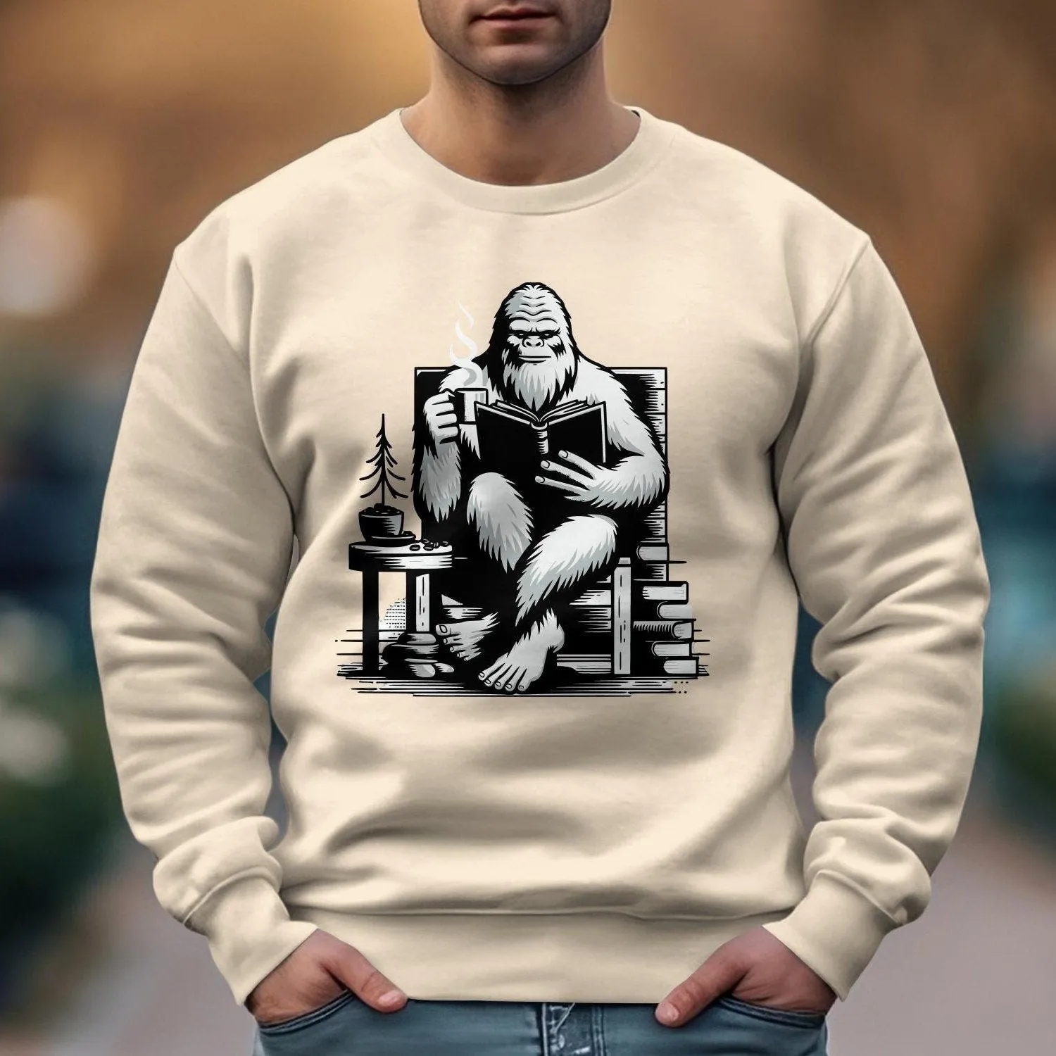 Reading Yeti Sweatshirt, Cozy Bigfoot Graphic Tee, Book Lover Gift, Cryptid Enthusiast Apparel, Coffee Lover Sweatshirt